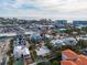 Aerial view showing a house with a pool, in a neighborhood near the coast at 306 55Th St, Holmes Beach, FL 34217