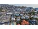 Aerial view of a house with a pool, situated in a coastal neighborhood at 306 55Th St, Holmes Beach, FL 34217