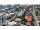 Aerial view of a house near the beach with a pool, surrounded by other homes at 306 55Th St, Holmes Beach, FL 34217