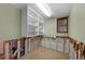 Unfinished laundry room with shelving and window at 306 55Th St, Holmes Beach, FL 34217