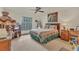 Cozy bedroom with double bed, dresser, and ceiling fan at 3340 Ulman Ave, North Port, FL 34286