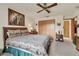 Large bedroom with double bed, dresser, and ceiling fan at 3340 Ulman Ave, North Port, FL 34286