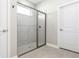 Modern shower with glass enclosure and gray tile at 3415 Nadasky Ave, North Port, FL 34288