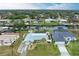 Aerial view of canal front homes with private pools and boat docks at 3438 Yukon Dr, Port Charlotte, FL 33948