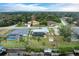 Aerial view showing home, pool, dock and waterway at 3438 Yukon Dr, Port Charlotte, FL 33948