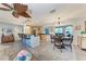 Bright dining room with a wood table and wicker chairs at 3438 Yukon Dr, Port Charlotte, FL 33948