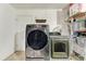 Functional laundry room with washer and dryer at 3438 Yukon Dr, Port Charlotte, FL 33948