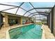 Inviting screened pool with ample deck space at 3438 Yukon Dr, Port Charlotte, FL 33948