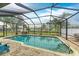 Refreshing screened pool overlooking canal at 3438 Yukon Dr, Port Charlotte, FL 33948