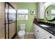 Well-lit bathroom with a shower, vanity, and stylish fixtures, offering a functional and modern space at 3501 Sunbeam Dr, Sarasota, FL 34240