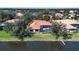 Aerial view of single-Gathering home with pool and canal access at 3716 Eagle Hammock Dr, Sarasota, FL 34240