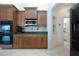 Kitchen boasts double ovens, gas cooktop, and built-in microwave at 3716 Eagle Hammock Dr, Sarasota, FL 34240