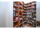 Large walk-in pantry with ample shelving for storage at 3716 Eagle Hammock Dr, Sarasota, FL 34240