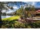 Relaxing pool and spa area with lush landscaping at 3716 Eagle Hammock Dr, Sarasota, FL 34240