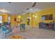 Living room with colorful decor and a view of the kitchen at 3906 Chaucer Ln, Sarasota, FL 34241