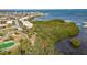 Aerial shot showcasing property's waterfront location with scenic views of the surrounding community at 4009 Catalina Dr # 178, Bradenton, FL 34210