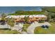 Aerial view of townhomes showcasing well-manicured landscaping, private driveways, and attached garages at 4009 Catalina Dr # 178, Bradenton, FL 34210