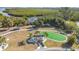 Aerial view highlighting the community's amenities, including a gazebo, putting green, and walking paths at 4009 Catalina Dr # 178, Bradenton, FL 34210