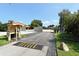 Community entrance gate with security features and well-maintained landscaping at 4009 Catalina Dr # 178, Bradenton, FL 34210