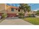 Townhouse exterior with attached garage and landscaping at 4009 Catalina Dr # 178, Bradenton, FL 34210