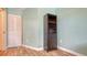 Hallway with wood-look floors and a wine rack at 4009 Catalina Dr # 178, Bradenton, FL 34210