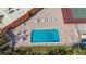 Community pool with plenty of lounge chairs at 4009 Catalina Dr # 178, Bradenton, FL 34210