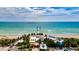 Aerial view of Venice beach, pier and ocean at 401 Shore Rd, Nokomis, FL 34275