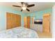 Bedroom with dresser and en-suite bathroom at 401 Shore Rd, Nokomis, FL 34275