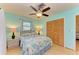 Bedroom with ceiling fan and large closet at 401 Shore Rd, Nokomis, FL 34275