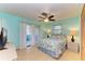 Main bedroom with sliding doors to patio at 401 Shore Rd, Nokomis, FL 34275