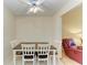 Simple dining area with wood table and chairs at 401 Shore Rd, Nokomis, FL 34275