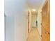 Light and bright hallway with wood flooring at 401 Shore Rd, Nokomis, FL 34275