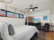 Main bedroom with a king-size bed and a relaxing sitting area at 4239 Gulf Of Mexico Dr # Mh4, Longboat Key, FL 34228