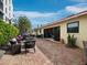 Spacious patio with seating and brick pavers at 4239 Gulf Of Mexico Dr # Mh4, Longboat Key, FL 34228