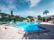 Community swimming pool with lounge chairs at 4239 Gulf Of Mexico Dr # Mh4, Longboat Key, FL 34228