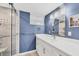 Updated bathroom with walk-in shower, modern vanity, and stylish fixtures at 4350 Chatham Dr # 208, Longboat Key, FL 34228