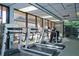 Community fitness center with treadmills and other exercise equipment at 4350 Chatham Dr # 208, Longboat Key, FL 34228