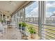 Spacious lanai with water views, perfect for relaxing and enjoying the scenery at 4350 Chatham Dr # 208, Longboat Key, FL 34228