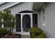 White front door with decorative screen at 4527 Fern Dr # 26, Bradenton, FL 34208