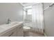 Clean bathroom with a bathtub, shower, and modern vanity at 4534 Pike Ave, Sarasota, FL 34233