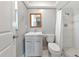 Clean and updated bathroom with a walk-in shower at 4534 Pike Ave, Sarasota, FL 34233