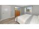 Well-lit bedroom with a double bed and dresser at 4534 Pike Ave, Sarasota, FL 34233