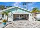 Attached garage with washer and dryer hookups and a storage area at 4534 Pike Ave, Sarasota, FL 34233