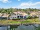 Aerial view of the property, showcasing its location and backyard at 4555 Forest Wood Trl # 23, Sarasota, FL 34241