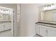 Updated bathroom with granite countertops and white cabinets at 4555 Forest Wood Trl # 23, Sarasota, FL 34241