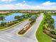 Gated entrance to community with lake view at 4653 Royal Dornoch Cir, Bradenton, FL 34211