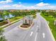 Gated community entrance with guardhouse, landscaping, and paved roads at 4653 Royal Dornoch Cir, Bradenton, FL 34211