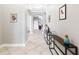 Bright and airy hallway with tile flooring at 4653 Royal Dornoch Cir, Bradenton, FL 34211