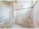 Large walk-in shower with tile surround and glass enclosure at 4653 Royal Dornoch Cir, Bradenton, FL 34211