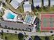 Aerial view of community pool, shuffleboard, and tennis courts at 4714 Potomac Cir, Bradenton, FL 34210